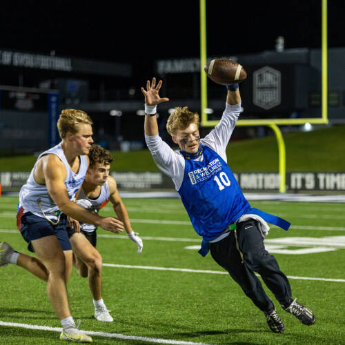 students playing flag football